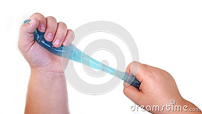 Kid playing blue slime with hand Stock Photo