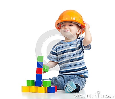 Kid playing with building blocks toy Stock Photo