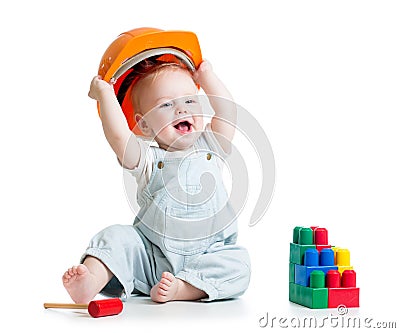 Kid playing with building blocks toy Stock Photo