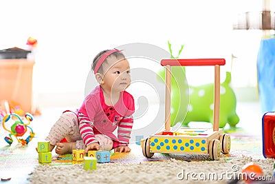 Kid playing toys Stock Photo