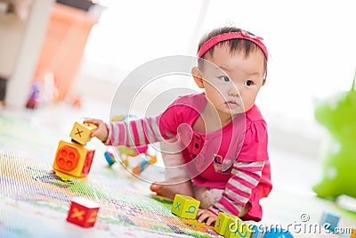 Kid playing toys Stock Photo