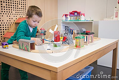 Kid plays with toys Stock Photo