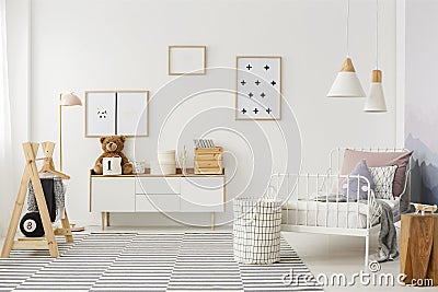 Kid`s bedroom with wooden furniture Stock Photo