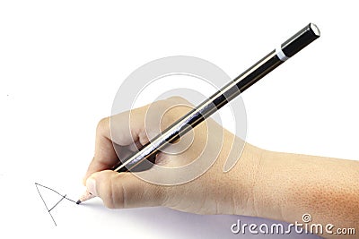 A kid`s hand with a pencil Stock Photo