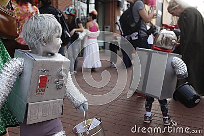 Kid safely trick or treat along Pearl street during the Munchkin Masquerade on Halloween day, Oct. 31, 2012. In Boulder, Editorial Stock Photo