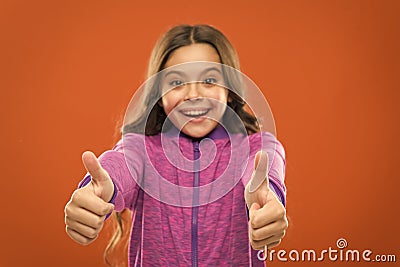 Kid show thumb up. Girl happy totally in love fond of or highly recommend. Thumb up approvement. Girl cute child show Stock Photo