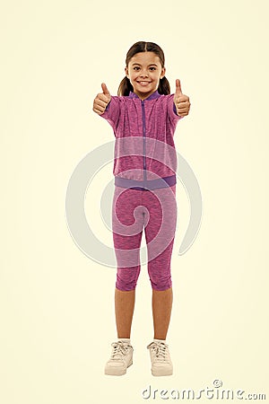 Kid show thumb up. Girl happy totally in love fond of or highly recommend. Thumb up approvement. Kids actually like Stock Photo