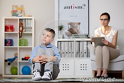 Kid sick of autism Stock Photo