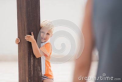 Kid smiles and play on terrace Stock Photo