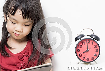 Kid Study time, Asian girl is reading a book Stock Photo