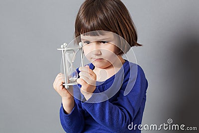 Kid time concept with an hour glass Stock Photo