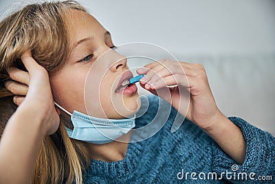 Kid undergoing treatment for a respiratory infection Stock Photo