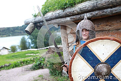 Kid in Viking Armor with shield Stock Photo