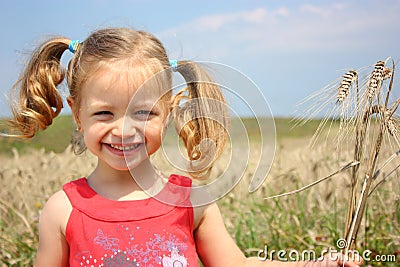 A kid with wheat Stock Photo