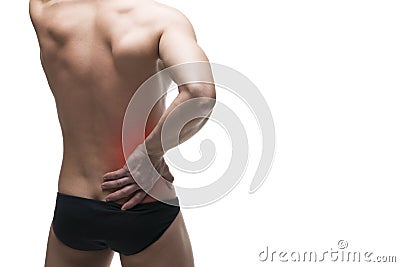 Kidney pain. Man with backache. Pain in the human body. Muscular male body. Isolated on white background Stock Photo