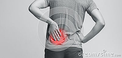 Kidneys pain, urolithiasis disease. Male body with inflamed loin Stock Photo