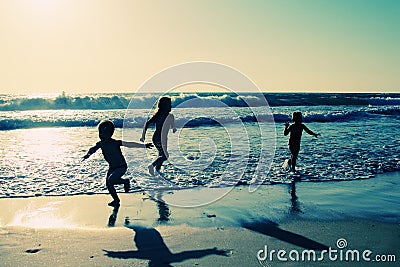 Kids on the beach Stock Photo