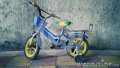 Kids bicycle in close view and blue one Stock Photo