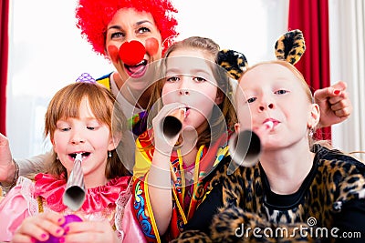 Kids birthday party with clown and lot of noise Stock Photo