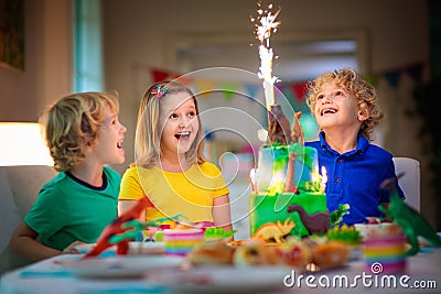 Kids birthday party. Dinosaur theme cake Stock Photo