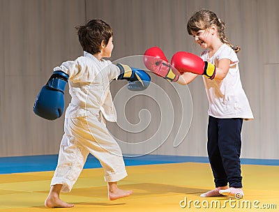 Kids with boxing gloves training Stock Photo