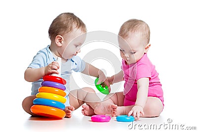 Kids boy and girl play toys together Stock Photo