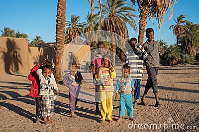 Curious Nubian children posing for a picture in Abri, Sudan - Dec 2018 Editorial Stock Photo