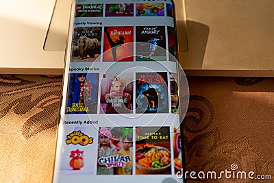 Kids cartoon and tv shows and movie displayed on a smartphone screen. Netflix kids app Editorial Stock Photo