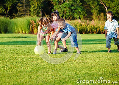 Kids catching the ball Stock Photo