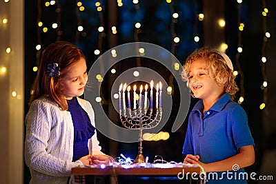 Kids celebrating Hanukkah. Festival of lights Stock Photo