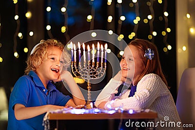 Kids celebrating Hanukkah. Festival of lights Stock Photo