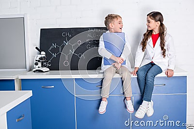 Kids in chemical laboratory Stock Photo