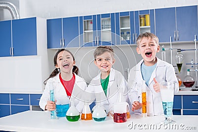 Kids in chemical laboratory Stock Photo