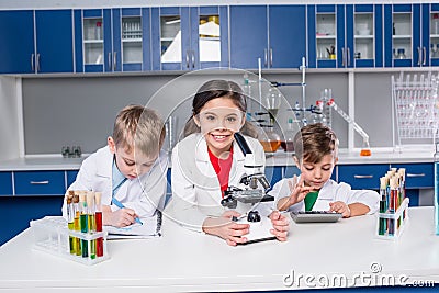 Kids in chemical laboratory Stock Photo