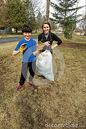 Kids Collecting Trash - Community Clean Up Stock Photo