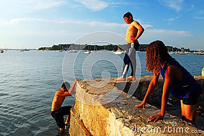 Kids cool off in the water Editorial Stock Photo