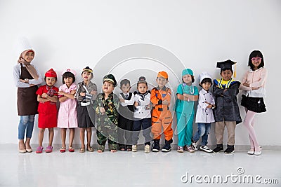 Kids with diverse multi profession uniform Stock Photo