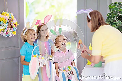 Kids Easter egg hunt. Child and eggs bunny ears Stock Photo