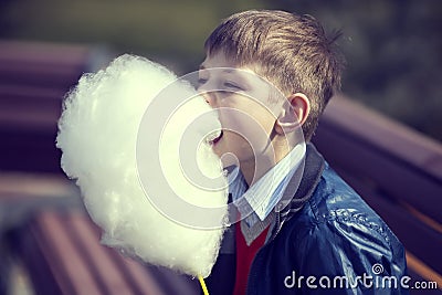 Kids eating cotton candy Stock Photo