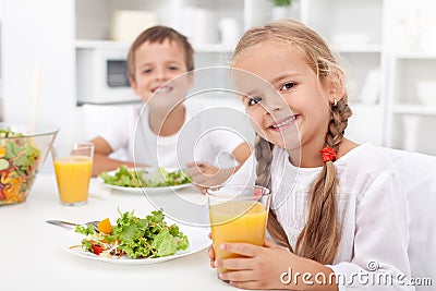 Kids eating a healthy meal Stock Photo