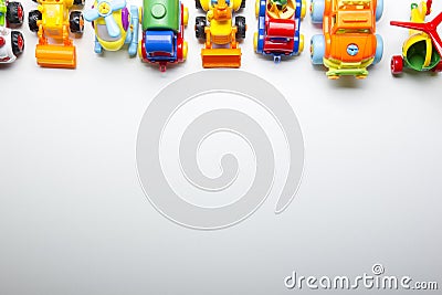 Kids educational developing toys frame on white background. Top view. Flat lay. Copy space for text Stock Photo