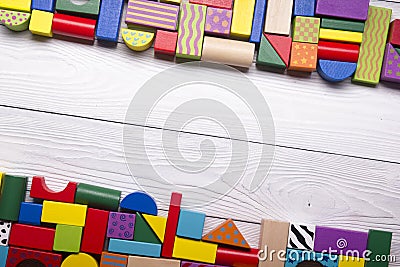 Kids educational developing toys frame on white background. Top view. Flat lay. Copy space for text Stock Photo