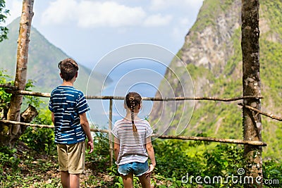 Kids enjoying view of Piton mountains Stock Photo