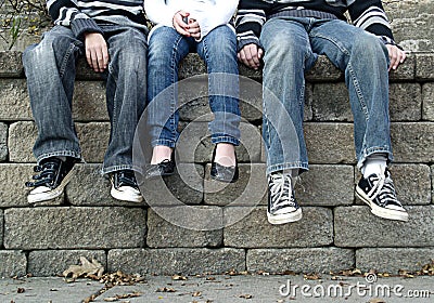 Kids feet dangling Stock Photo