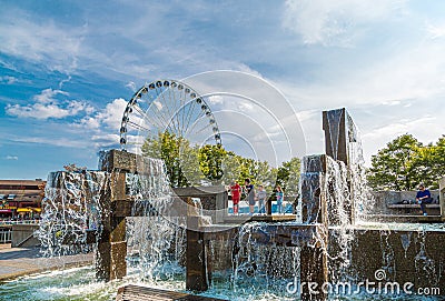 Kids in Fountain by Great Wheel Editorial Stock Photo