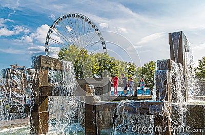 Kids in Fountain by Great Wheel Editorial Stock Photo