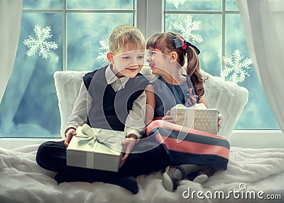 Kids with gifts for Christmas Stock Photo