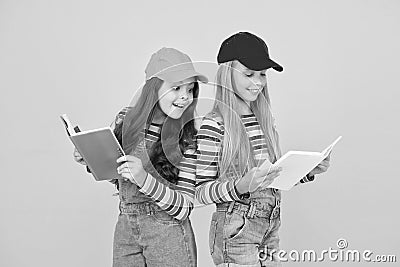 Kids girls with books study together. Study group can help solidify and clarify material. Back to school. Learning Stock Photo