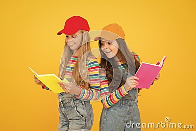 Kids girls with books study together. Study group can help solidify and clarify material. Back to school. Learning Stock Photo