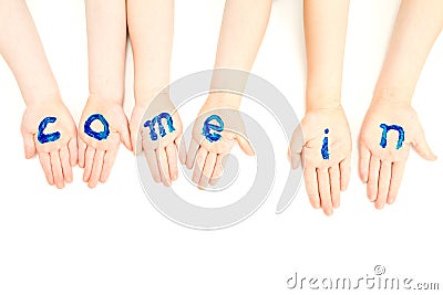 Kids hands painted with welcome come in sign Stock Photo